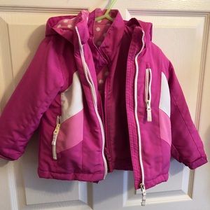 pink and white snow coat